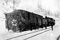 Great Northern Railway snowplow in the Cascades, ca 1910 (TRANSPORT 252).jpg
