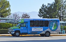 Irvine Shuttle (iShuttle), operated by the OCTA at the Irvine Transportation Center in Irvine, California Irvine Station (2013) 07 (cropped).JPG