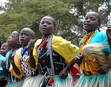 Kenyan boys and girls performing a traditional dance Kenyan dancers.jpg