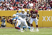 White with the 2018 Los Angeles Chargers tackling Washington Football Team running back Antonio Gibson, September 12, 2021 Kyzir White tackle (51459802907).jpg