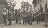 Berkeley School of Mining students at the entrance to Lawson Adit in 1918 during a mine rescue drill. One of the men is carrying a box from the Hercules Powder Company. Lawson Adit 1918.PNG