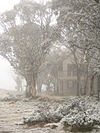 A lodge at Dinner Plain near the Cobungra Platter in falling snow