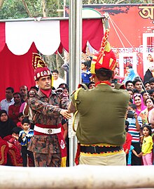 Indian and Bangladeshi soldiers at Benapole-Petrapole border ceremony. Lowering of Flag.JPG