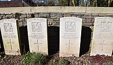 Graves of five soldiers in the cemetery of Ervillers. Manchester Regiment - Graves of soldiers in the cemetery of Croisilles.jpg