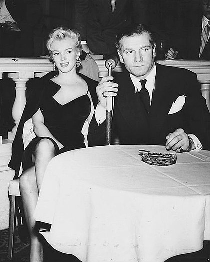 Marilyn Monroe and Laurence Olivier at a press conference announcing their partnership