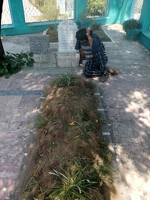 Mendicant at the grave.jpg