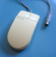 Microsoft InPort(tm) bus mouse, showing the 9-pin round connector Microsoft InPort BUS Mouse.png