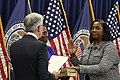 Lisa D. Cook sworn in as a member of the Federal Reserve Board of Governors by Jerome Powell in May 2022.