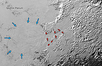 Nitrogen ice glaciers flow from uplands through valleys into east Sputnik Planitia (context). Arrows indicate valley sides (which are 3 to 8 km apart) and the flow front in the planitia.
