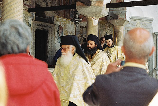 Orthodox Priests enter the Monastery of Saint Johns