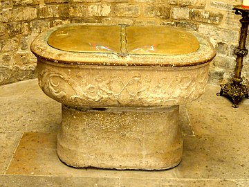 THe baptismal font, in the form of the cradle of Moses (16th century)