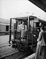 Queen Elizabeth II standing on platform of her railway carriage at Masterton. PHOTOGRAPHER J.F. Le Cren DATE 15 January 1954 (cropped).jpg