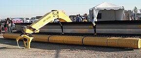 Windrow mergers (large belt rakes with a pick-up unit)