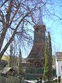 Holzglockenturm in Rigmani