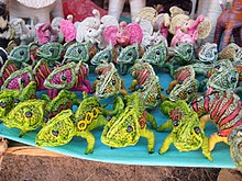 Toy animals made from raffia, a native palm Raffia animals created by artisans in Madagascar.jpg