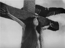 Still of one of the crucified girls in the movie