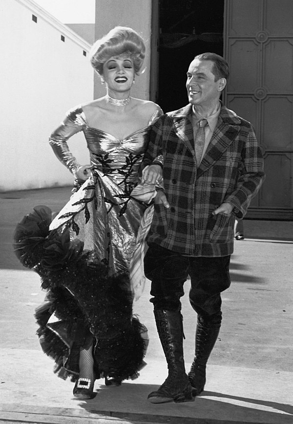 Dietrich and Robert W. Service on the set.