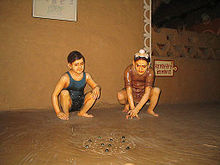 Sculpture depicting village kids playing marbles jalandhar Punjab haveli rangla Punjab Sculpture depicting village kids playing marbles jalandhar punjab haveli rangla punjab.jpg