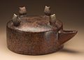 "Spouted_Vessel_with_Four_Houses_LACMA_M.90.168.31.jpg" by User:Fæ