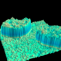 English: Image of substitutional Cr impurities (small bumps) in the Fe (001) surfaces. Polski: Obraz zanieczyszczeń powierzchni żelaza przez chrom (małe guzki).