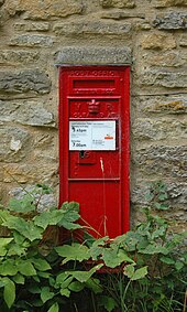 Victorian era Post Office wall box outside a cottage in Back Lane SteepleBarton PostBox.jpg