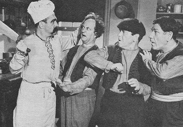 A thinner Curly (with a full head of hair and false handlebar mustache) as the cook in Malice in the Palace (1949) with Larry, Moe and Shemp: Curly's 