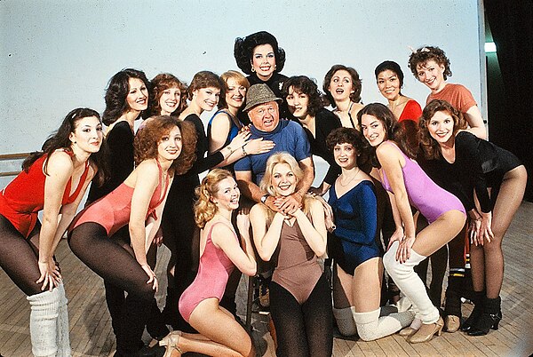 Cast of first production of Sugar Babies, 1979 musical. Center, top to bottom, are Ann Miller, Mickey Rooney, Ann Jillian.