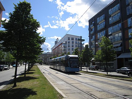 An urban city using train transportation to remove traffic congestion.