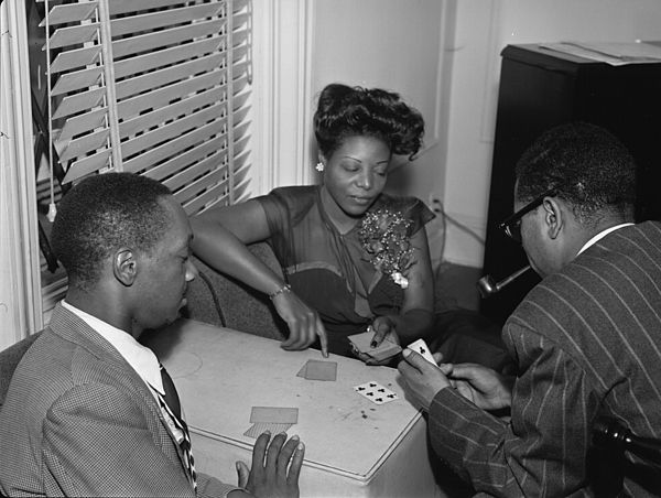 Tadd Dameron, Mary Lou Williams, and Dizzy Gillespie in Williams's apartment, c. June 1946