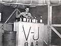 Tending bar, 1945 (7152430959).jpg