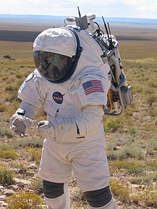 Test of LOCAD-PTS swab system during simulated surface Extravehicular Activity (EVA) at Meteor Crater, NASA Desert RATS (September 2005). Test of LOCAD-PTS swab system during EVA at NASA Desert RATS 2005.JPG