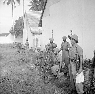 Troops of the 26th Indian Division man mortars just outside Medan in Sumatra. The Allied Occupation of Sumatra SE7516.jpg