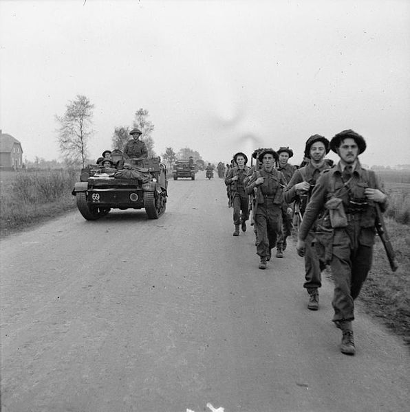 Universal Carriers and infantry of the 2nd Battalion, Argyll and Sutherland Highlanders move up for the attack on Tilburg, Netherlands, 27 October 194