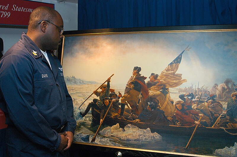 File:US Navy 040222-N-1522S-015 Personnelman 1st Class Larry Davis, of Rockhill, S.C., admires a painting in the museum aboard USS George Washington (CVN 73) during a celebration of President Washington's 272nd birthday.jpg