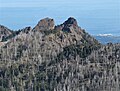 Unicorn Peak (left) and Unicorn Horn (right) seen from Hurricane Hill, with Port Angeles and Strait of Juan de Fuca in the distance.