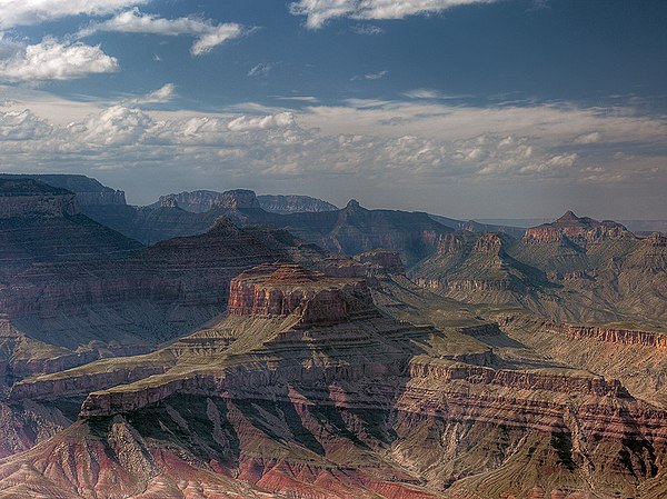 view opposite Lipan Point, (at Desert View (Grand Canyon), East Rim), showing the banded Nankoweap Formation, (horizontal Tapeats at left, extending a