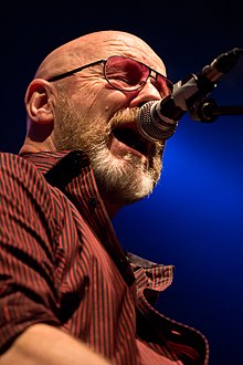 Powell on stage with Wishbone Ash in May 2015