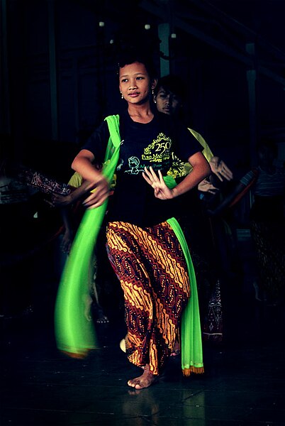 File:Woman with green scarf dancing.jpg