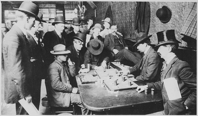 Gambling at the Orient Saloon in Bisbee, Arizona, photographed by C.S. Fly in c. 1900