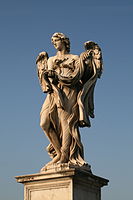 Angel bearing a garment and dice by Paolo Naldini western side of the Ponte Sant'Angelo in in Rome, Italy.