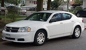 2013 Dodge Avenger SE in Bright White, front left.jpg