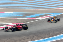 Charles Leclerc leading Max Verstappen before his crash on lap 18 2022 French Grand Prix (52279025006).png