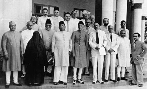 Picture of a meeting of the All-India Muslim League in Lahore in 1940 showing a woman in a body length burqa.