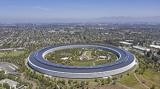 Apple Inc. headquarters of neo-futuristic architecture at Apple Park in Cupertino, California, United States. Apple park cupertino 2019.jpg