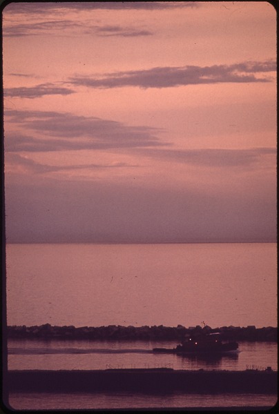 File:BARGE TUG MANEUVERING BEHIND BREAKWATER AT LUDINGTON CONSUMER POWER PLANT - NARA - 547110.tif