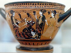 Coupe à figures noires. Dionysos en turban parmi des musiciennes, vers -520 /-500.