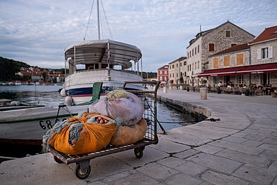 Boats and fishing nets on the Stari Grad harbour, Croatia