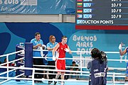 Deutsch: Boxen bei den Olympischen Jugendspielen 2018 Tag 12, 18. Oktober 2018 - Kampf um die Bronzemedaille im Fliegengewicht Mädchen – Timur Merjanow (Usbekistan, rot) schlägt Youssef Ali Karar Ali (Ägypten, blau) 5-0; Ringrichter ist Antonín Gaspar (Tschechien). English: Boxing at the 2018 Summer Youth Olympics on 18 October 2018 – Boy's heavyweight Bronze Medal Bout - Timur Merjanov (Uzbekistan, red) beats Youssef Ali Karar Ali (Egypt, blue) 5-0; Referee is Antonín Gaspar (Czech Republic). Español: Boxeo en los Juegos Olímpicos Juveniles de Verano de 2018 en 18 de octubre de 2018 - Medalla de bronce de peso pesado del muchacho: Timur Merjanov (Uzbekistán, roja) le gana a Youssef Ali Karar Ali (Egipto, azul) 5-0; El árbitro es Antonín Gaspar (Republica checa).