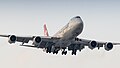 Cargolux 747-8F on final approach for runway 36C (39641984925).jpg
