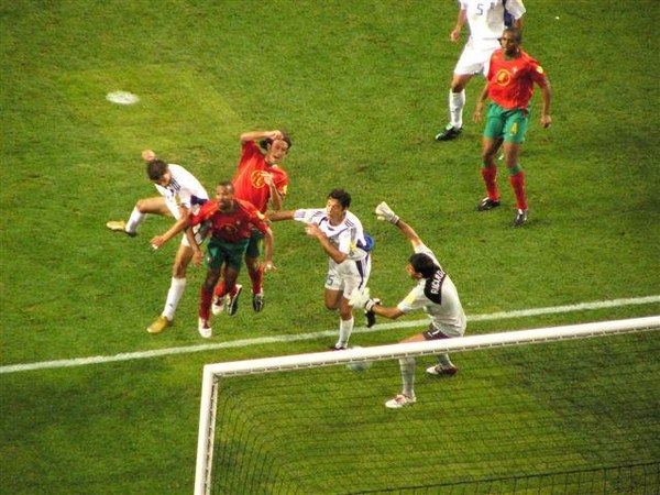 Angelos Charisteas (first from left with white shirt), scoring Greece's winner against Portugal in the final.